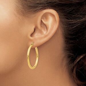 Brand New 14k gold medium hoop earrings